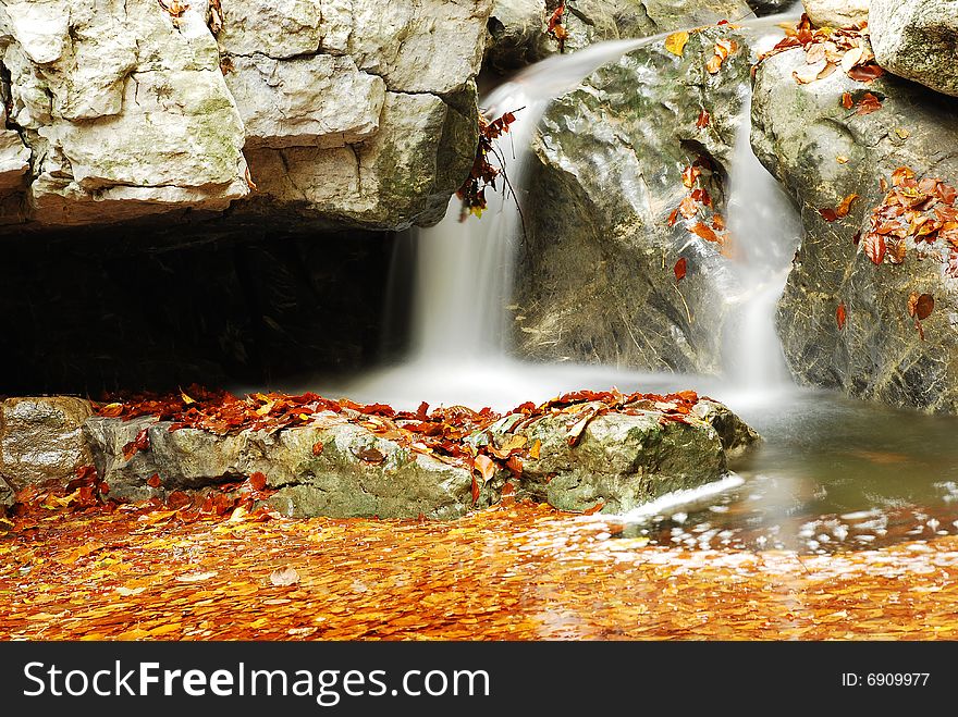 Flowing water into small waterfalls