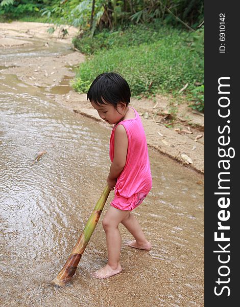 Children playing on the stream