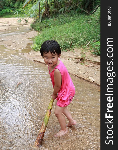 Children playing on the stream