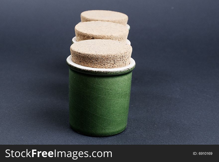 Three green jar isolated on a blackground. Three green jar isolated on a blackground
