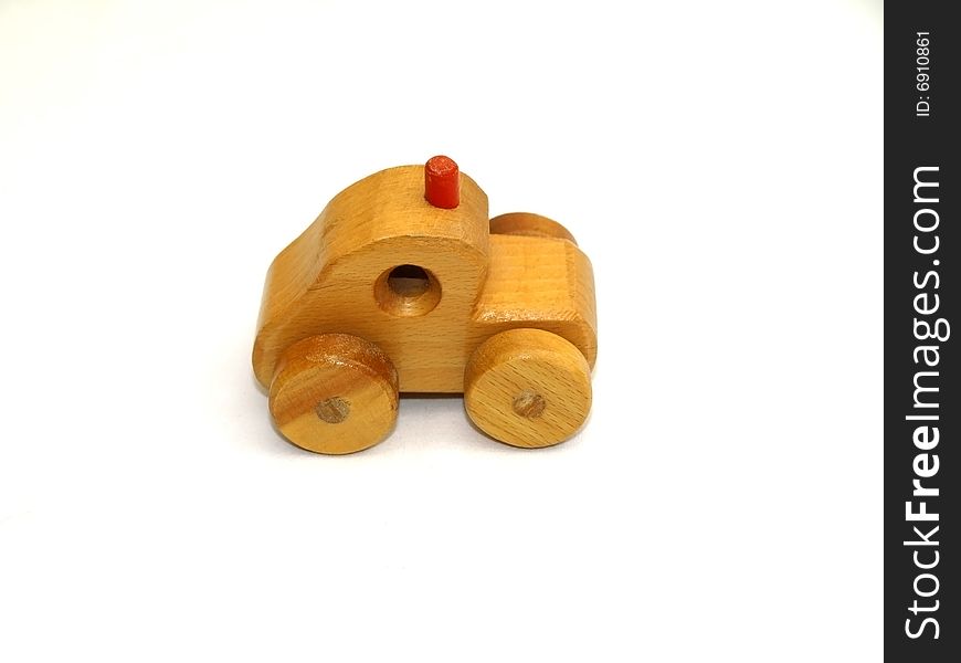 Wooden toy car, side-view on white background. Wooden toy car, side-view on white background