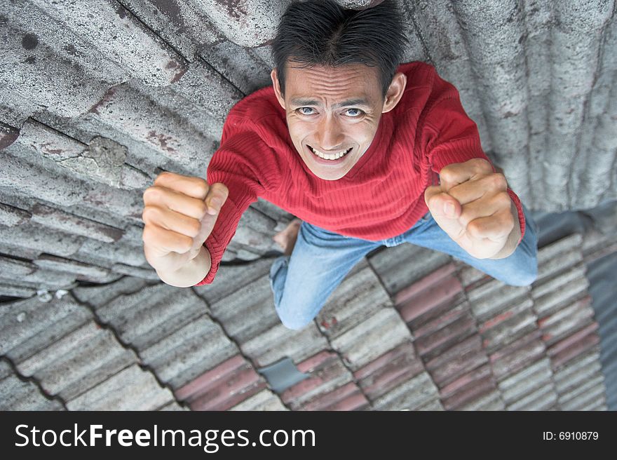 Man with his expression on the roof. Man with his expression on the roof