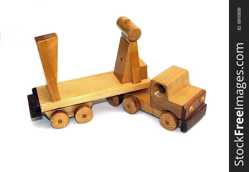 Wooden toy Macktruck, front-view, on white background. Wooden toy Macktruck, front-view, on white background