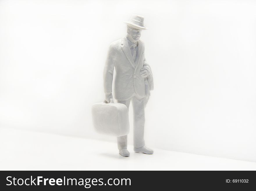 White model, man in suit holding suitcase, on white background. White model, man in suit holding suitcase, on white background