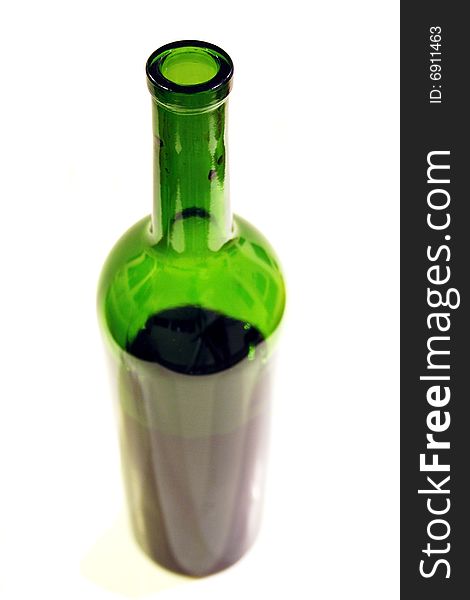 Wine bottle with shallow depth of field on white background
