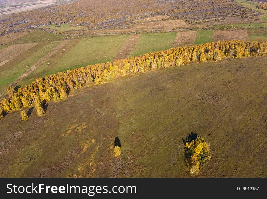 Aerial view of landscape of vast plains and forest in Siberia, Russian Federation. Aerial view of landscape of vast plains and forest in Siberia, Russian Federation.