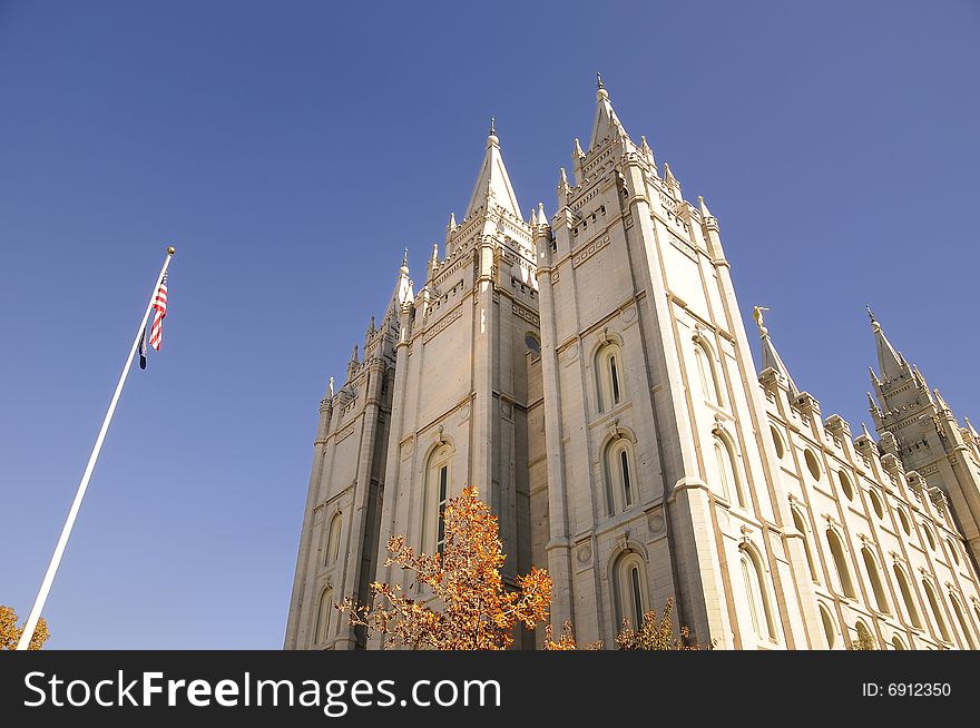 Looking up at a mormon temple in the fall