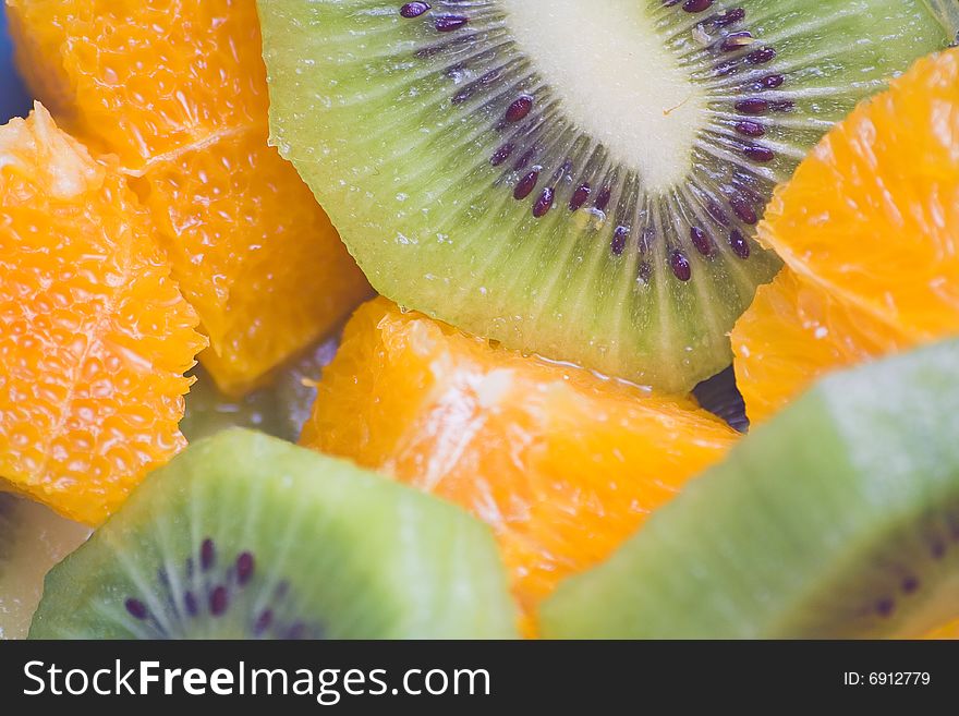 Dessert of kiwi and orange slices fresh