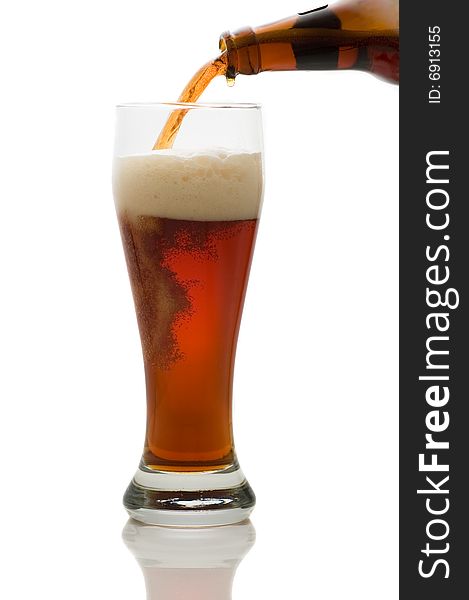 Glass of beer isolated on white