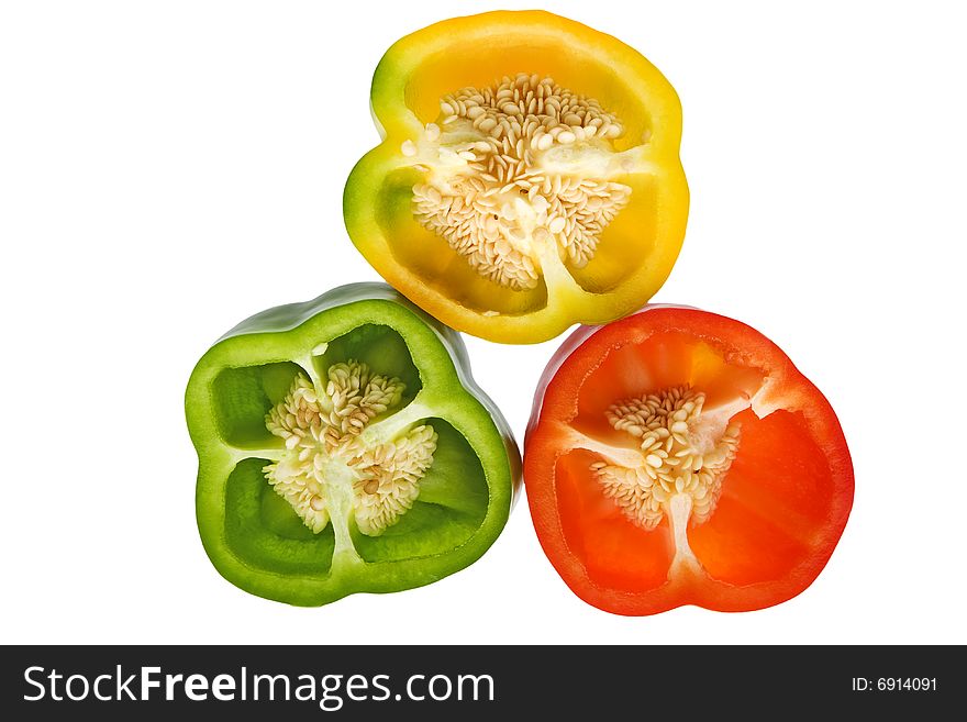 Peppers in three colors, against a white background isolate