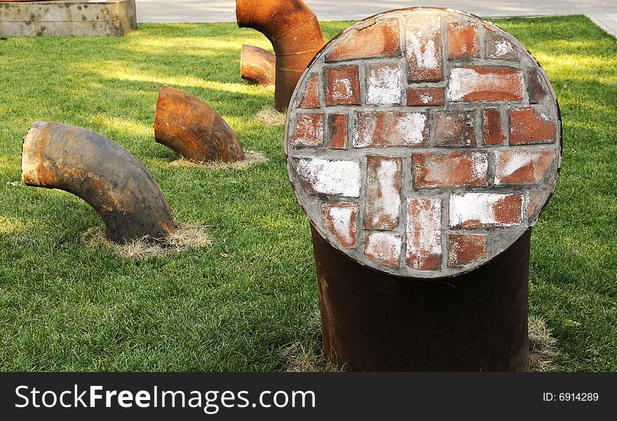 Iron Tube Pluged With Bricks