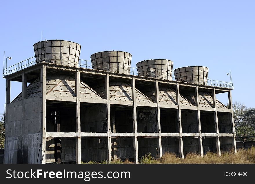 Funnels and buildings in the factory. Funnels and buildings in the factory