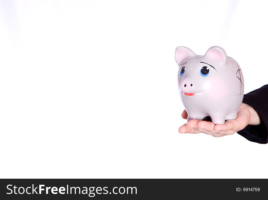 Holding piggy bank on the white background