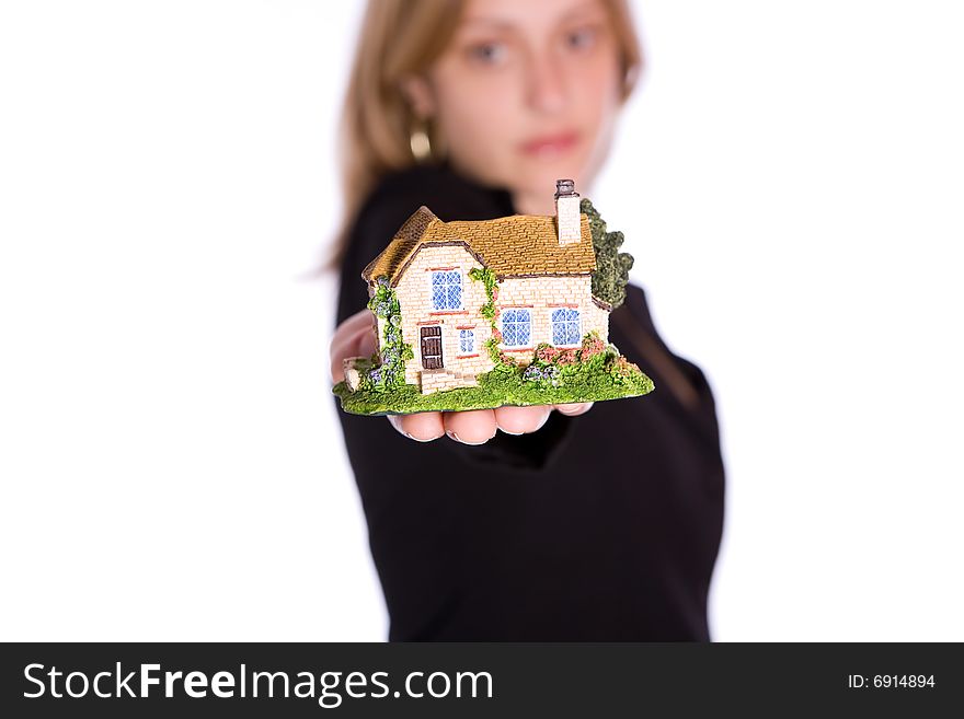 Holding small house on the white background. Holding small house on the white background