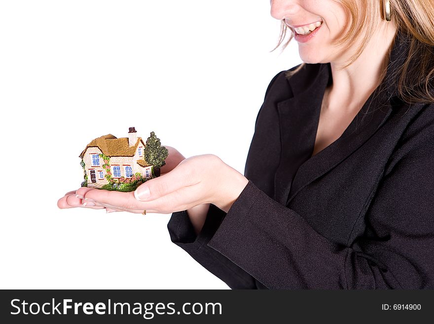 Holding small house on the white background. Holding small house on the white background