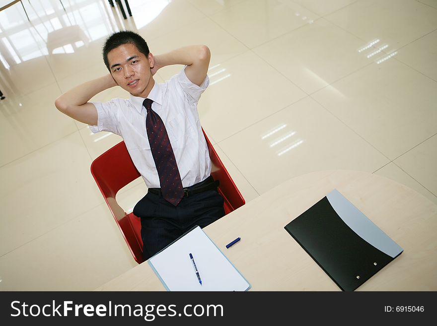 Young  Businessman In His Office