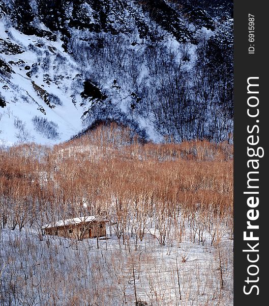 Snowy mountain hut