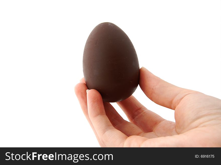 An Isolated to White photo of a mini Easter Egg with toy inside. An Isolated to White photo of a mini Easter Egg with toy inside