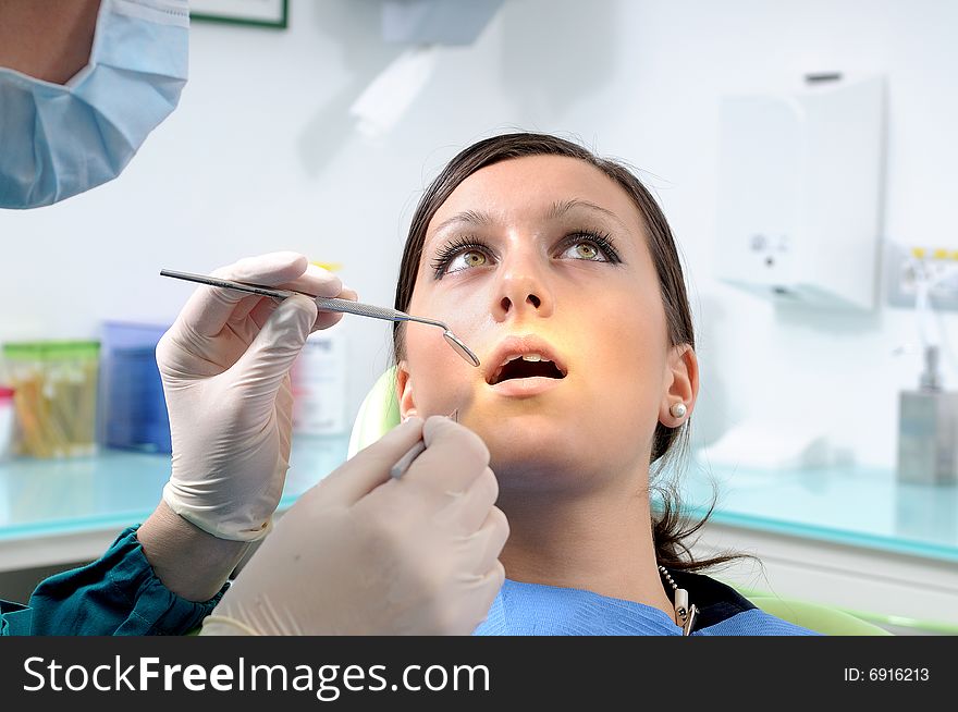 Woman and dentist,denture,care of tooth. Woman and dentist,denture,care of tooth