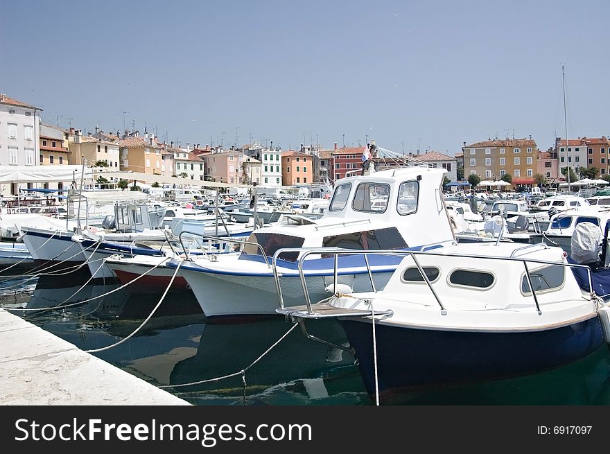 Yachts anchored near in the Rovinj bay. Yachts anchored near in the Rovinj bay