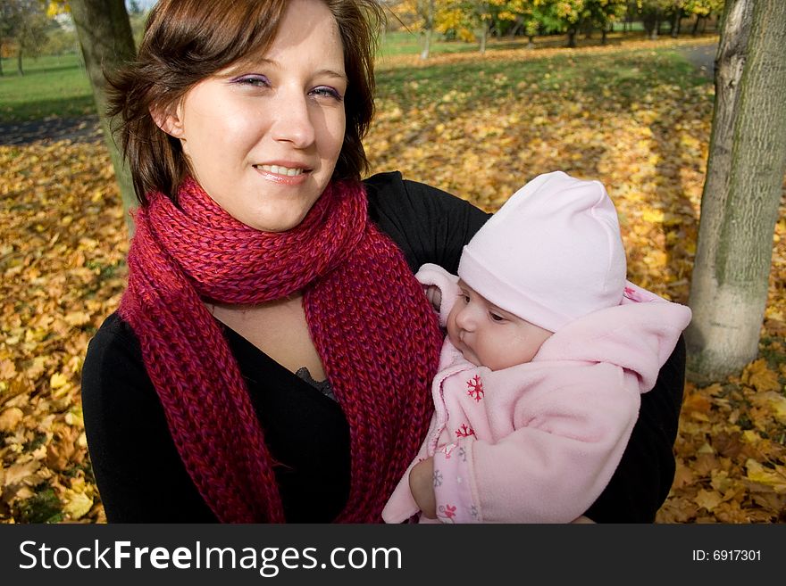 Happy mother with baby outdoor. Happy mother with baby outdoor