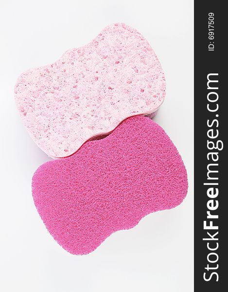 Colorful absorbent scrub sponge - closeup isolated on white