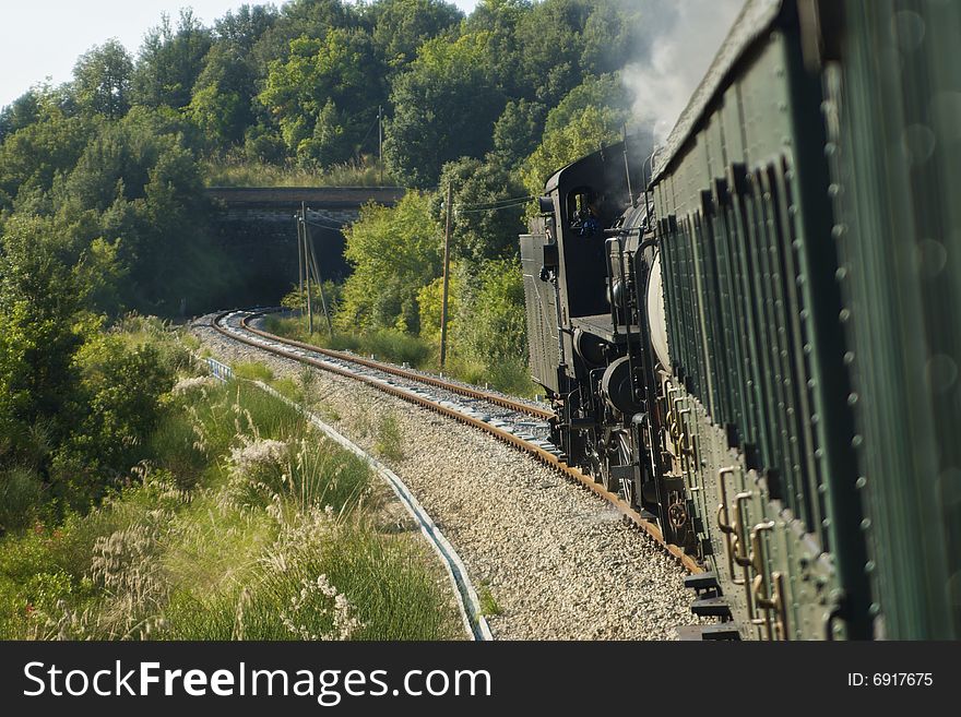 A view of locomotive from the window. A view of locomotive from the window