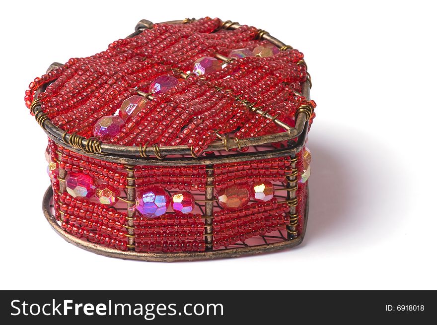 Heart-shaped casket decorated by glass beads isolated on white. Heart-shaped casket decorated by glass beads isolated on white