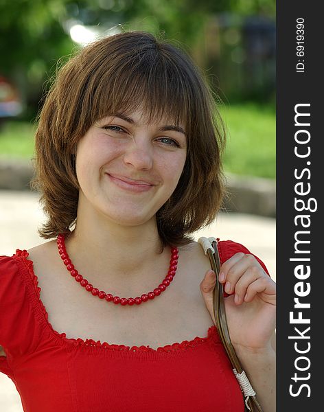 Joyful smile. Young woman in picture. Marchuk.