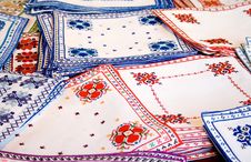White Fabrics With Colorful Embroidery Stock Photos