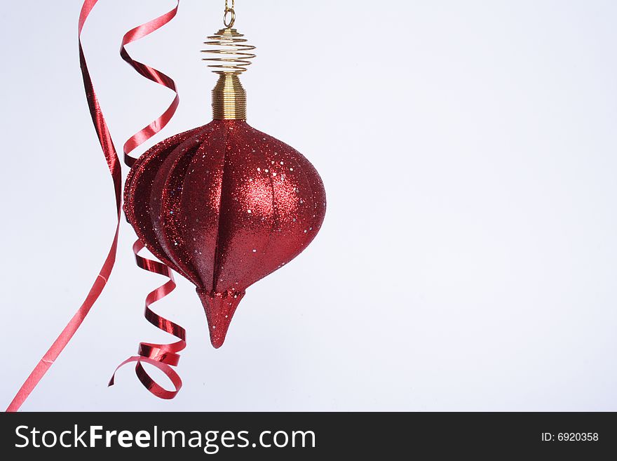 Hanging decorative Christmas ball in white background. Hanging decorative Christmas ball in white background