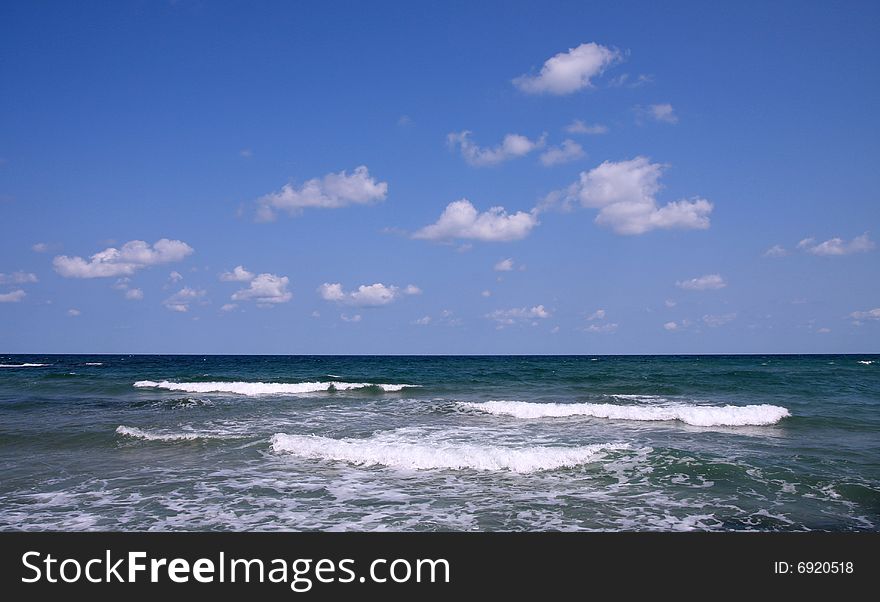 Black Sea, Bulgaria. Waves and white clouds. Black Sea, Bulgaria. Waves and white clouds.