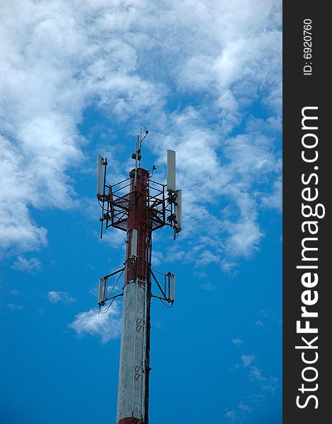 Telecommunication tower in blue sky