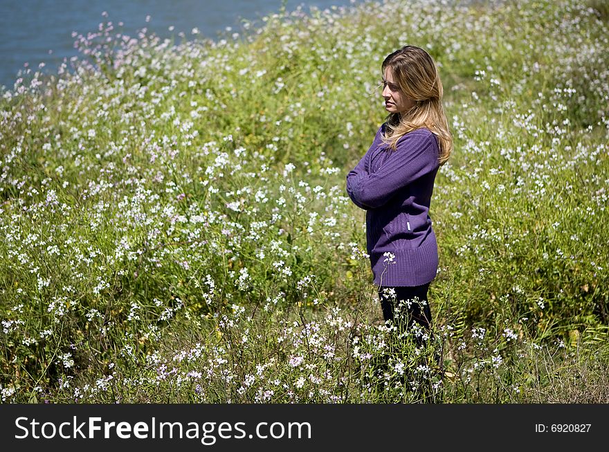 Beautiful woman on the fields flowers. Beautiful woman on the fields flowers