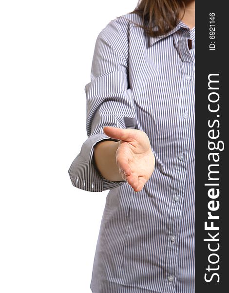 A business woman reaches for a handshake in front of the office building. A business woman reaches for a handshake in front of the office building