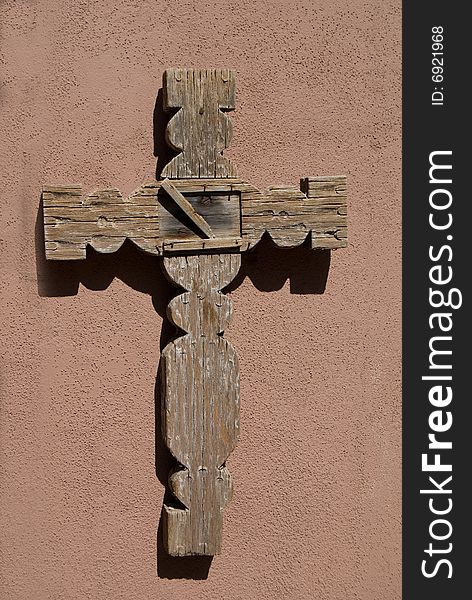 Wooden Cross On Adobe