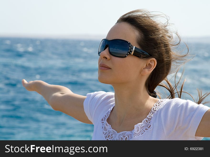 Young woman near a sea