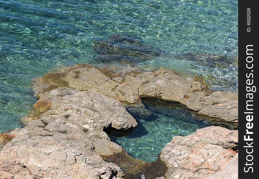 Clear blue croatian seashore in a sunny day. Clear blue croatian seashore in a sunny day.