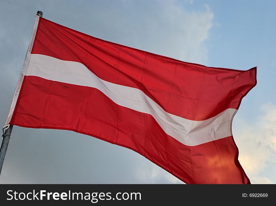Austrian flag waves in the wind.