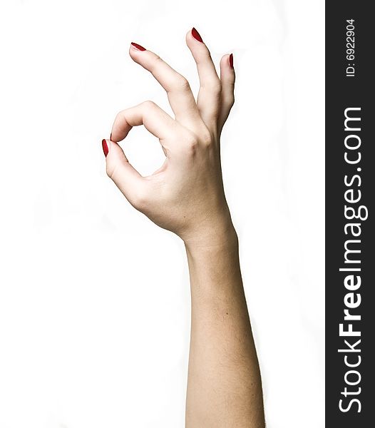 Womanish hand with a red manicure. Womanish hand with a red manicure