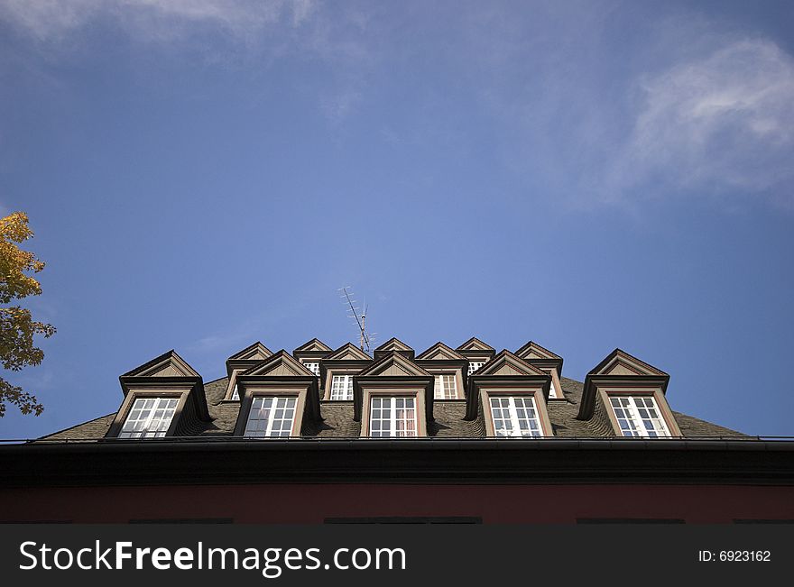 Attics all over on urban house sky blue