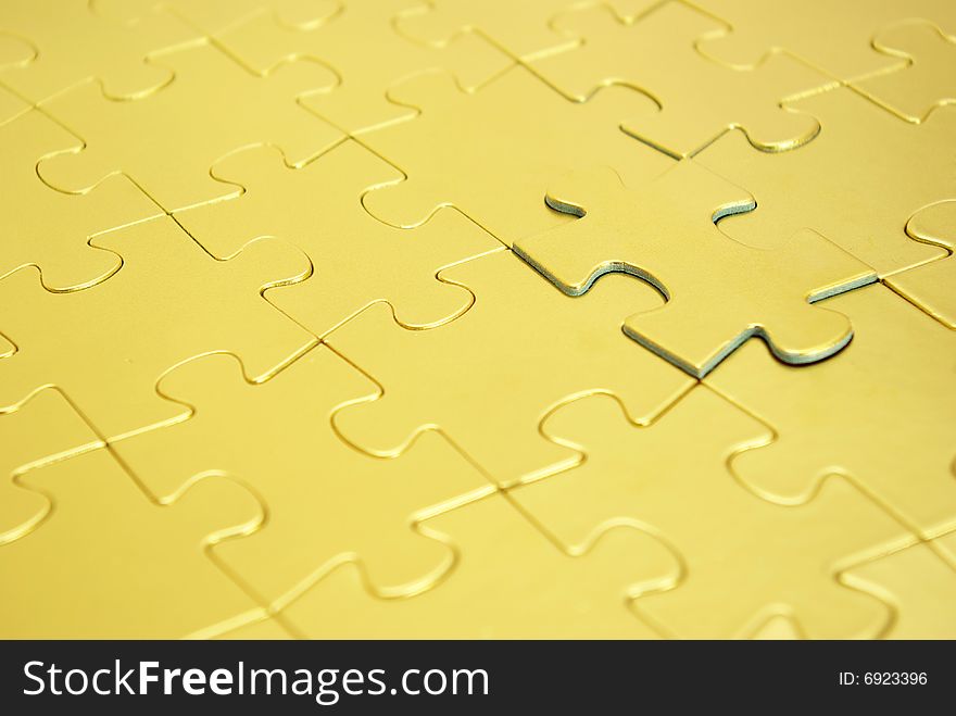 Gold puzzles for background. business concept