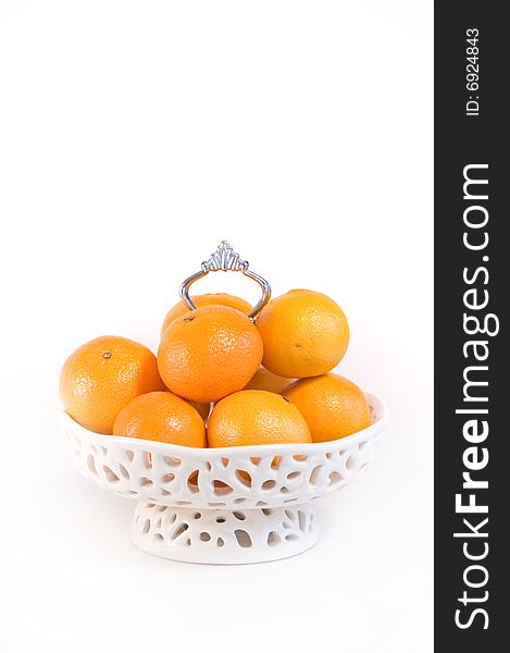 Luxe white Bowl filled with mandarin fruit. Luxe white Bowl filled with mandarin fruit