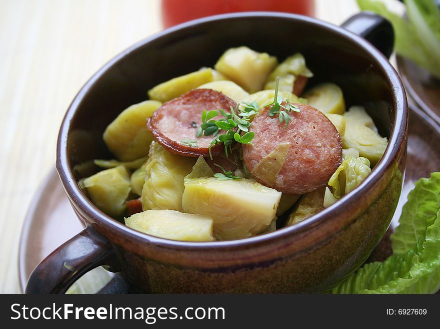 A fresh stew of brussels with sausages