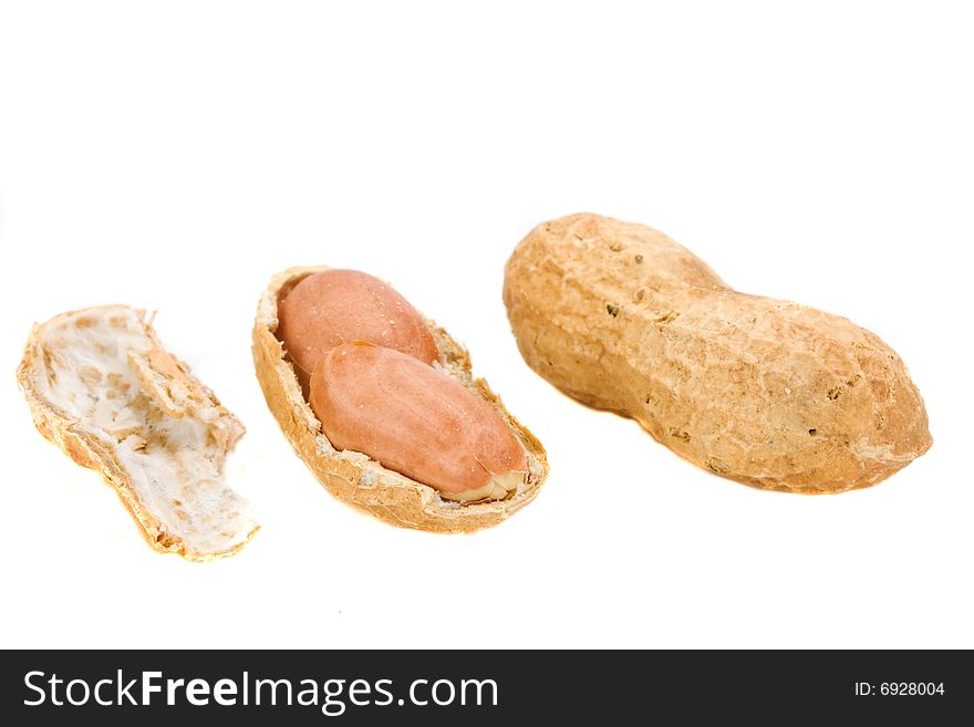 Some natural peanuts on white background