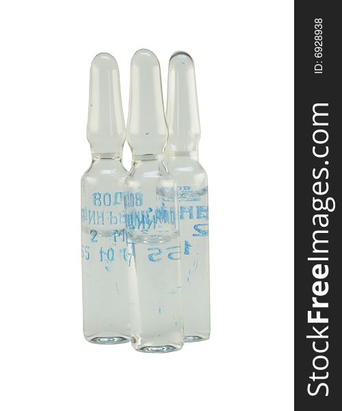 Three ampoules on the white background
