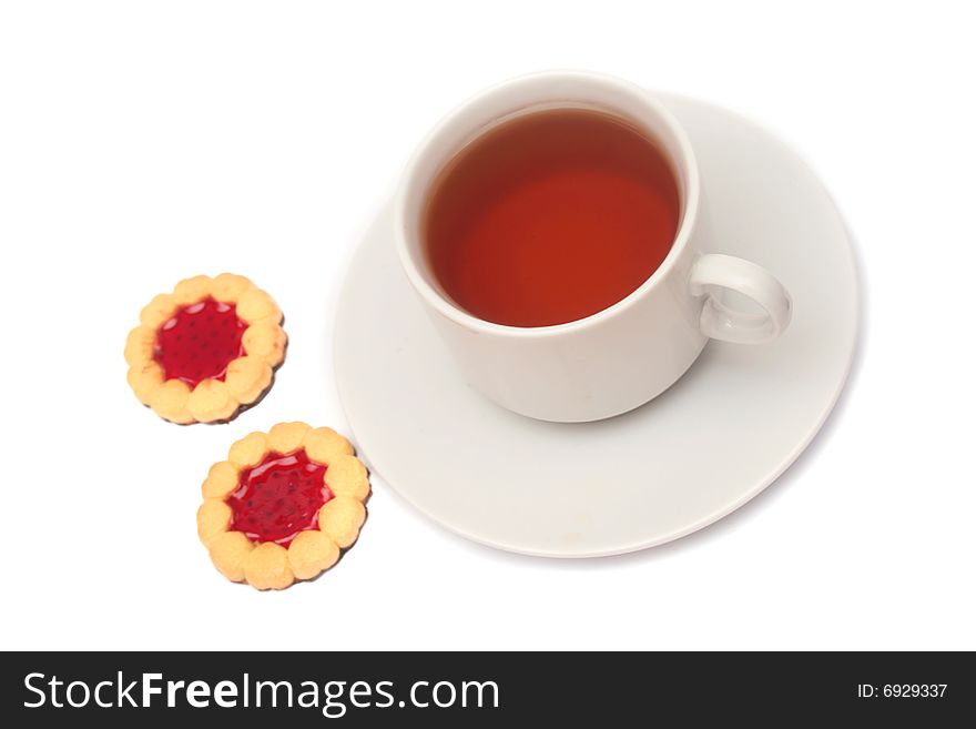 Cup of tea and cookies isolated on white. Cup of tea and cookies isolated on white.