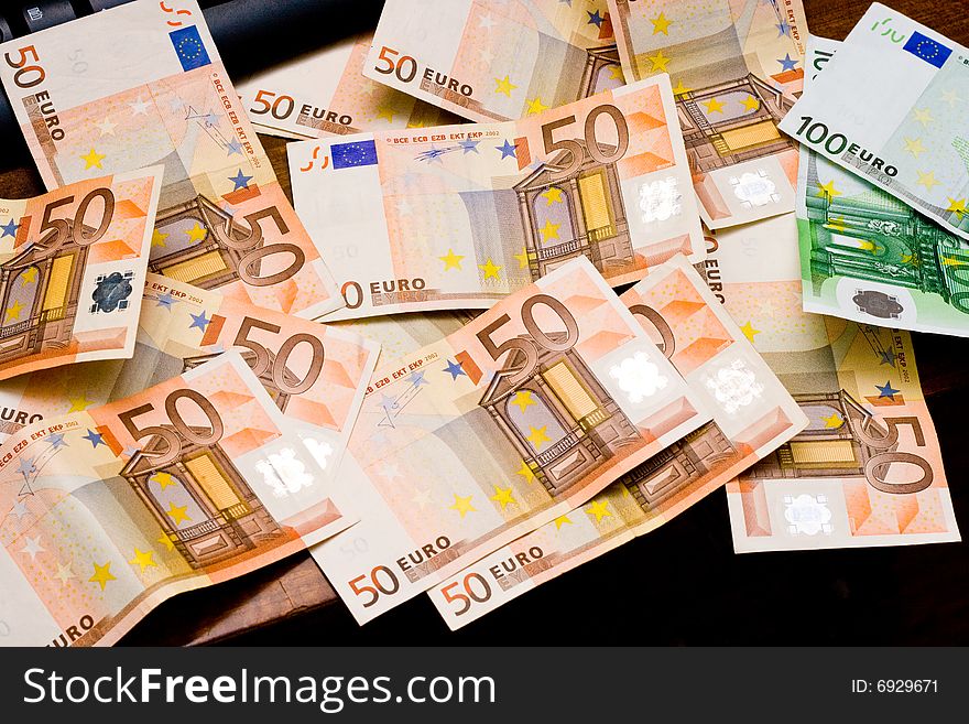 Euro banknotes, money on a dark background