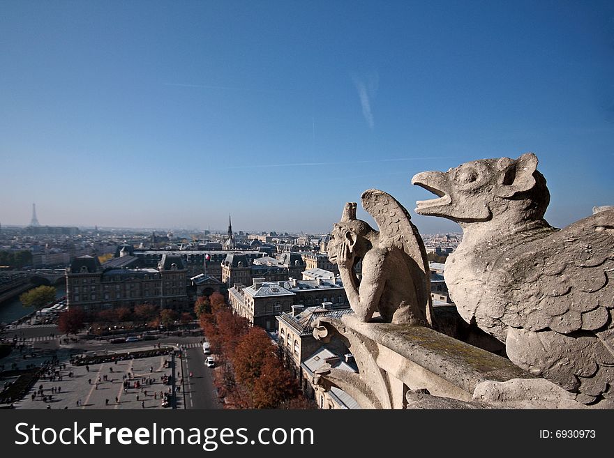 The Gargoyles of Notre Dame looking out over Paris