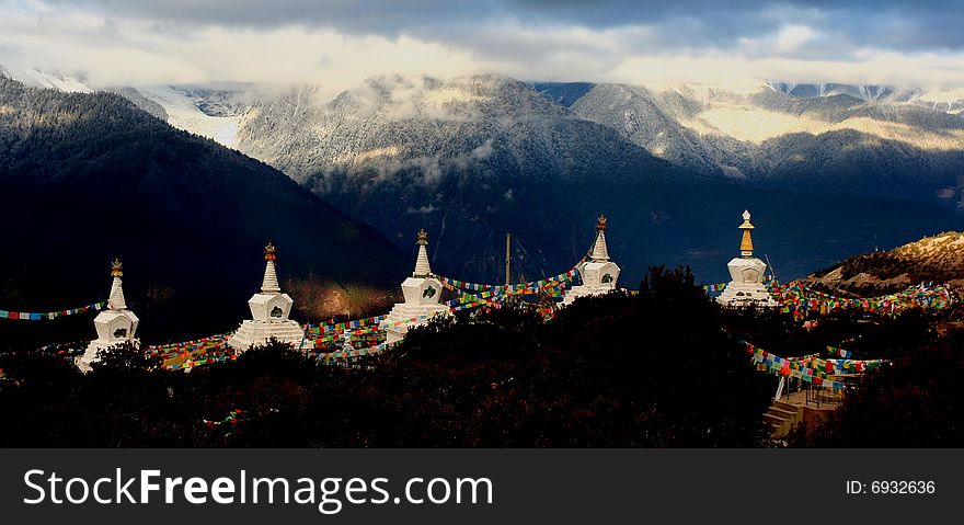 Five stupas in front of Meili Snow Mt